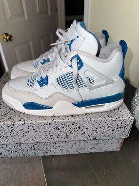 Jordan Retro 4’s . Off White & Military Blue. Grade school size 7